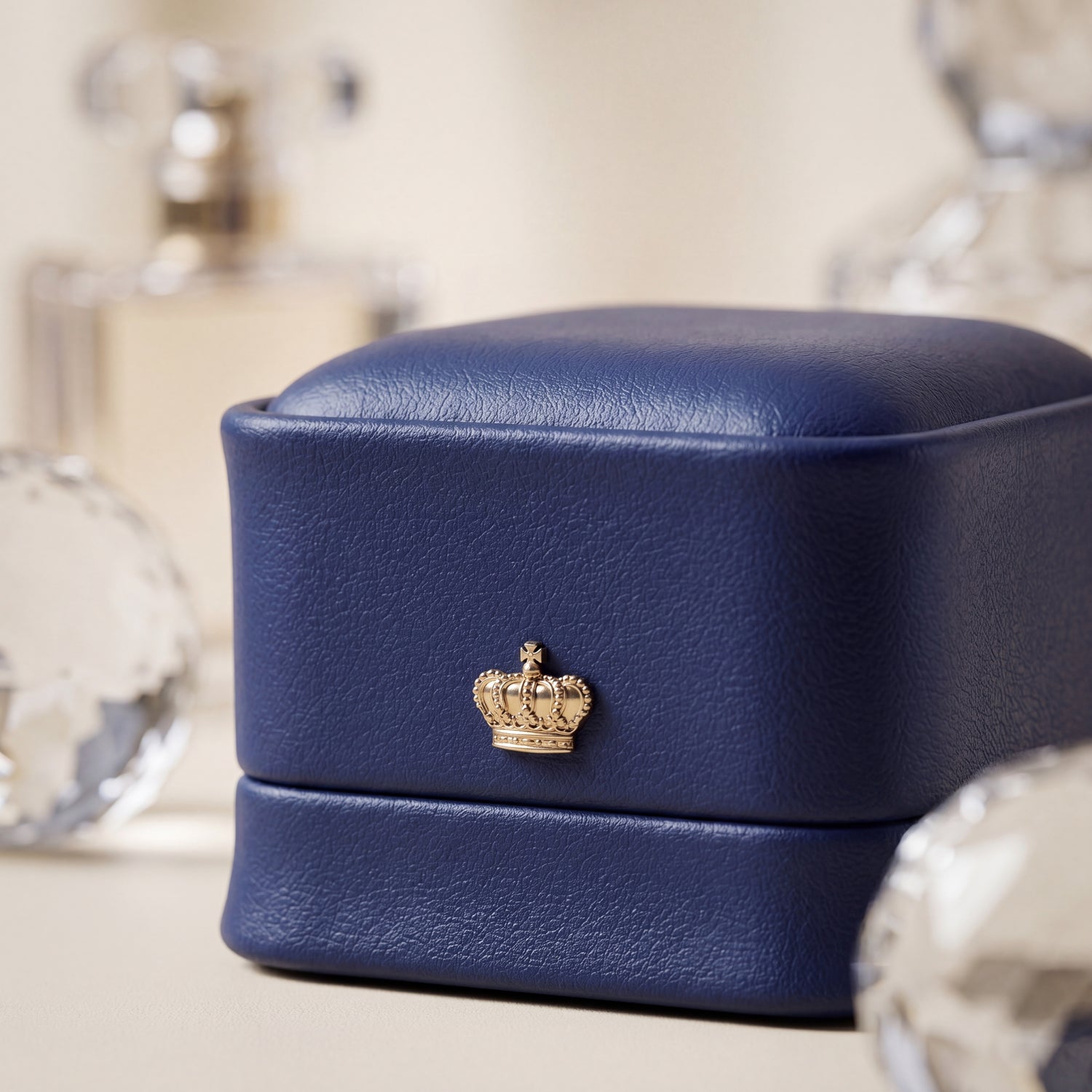 Sapphire Blue ring box leather texture close-up gold crown detail · Ormelya