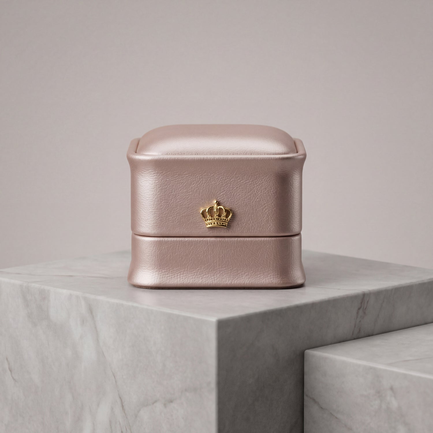 Rose Gold leather ring box closed front view with gold crown · Ormelya