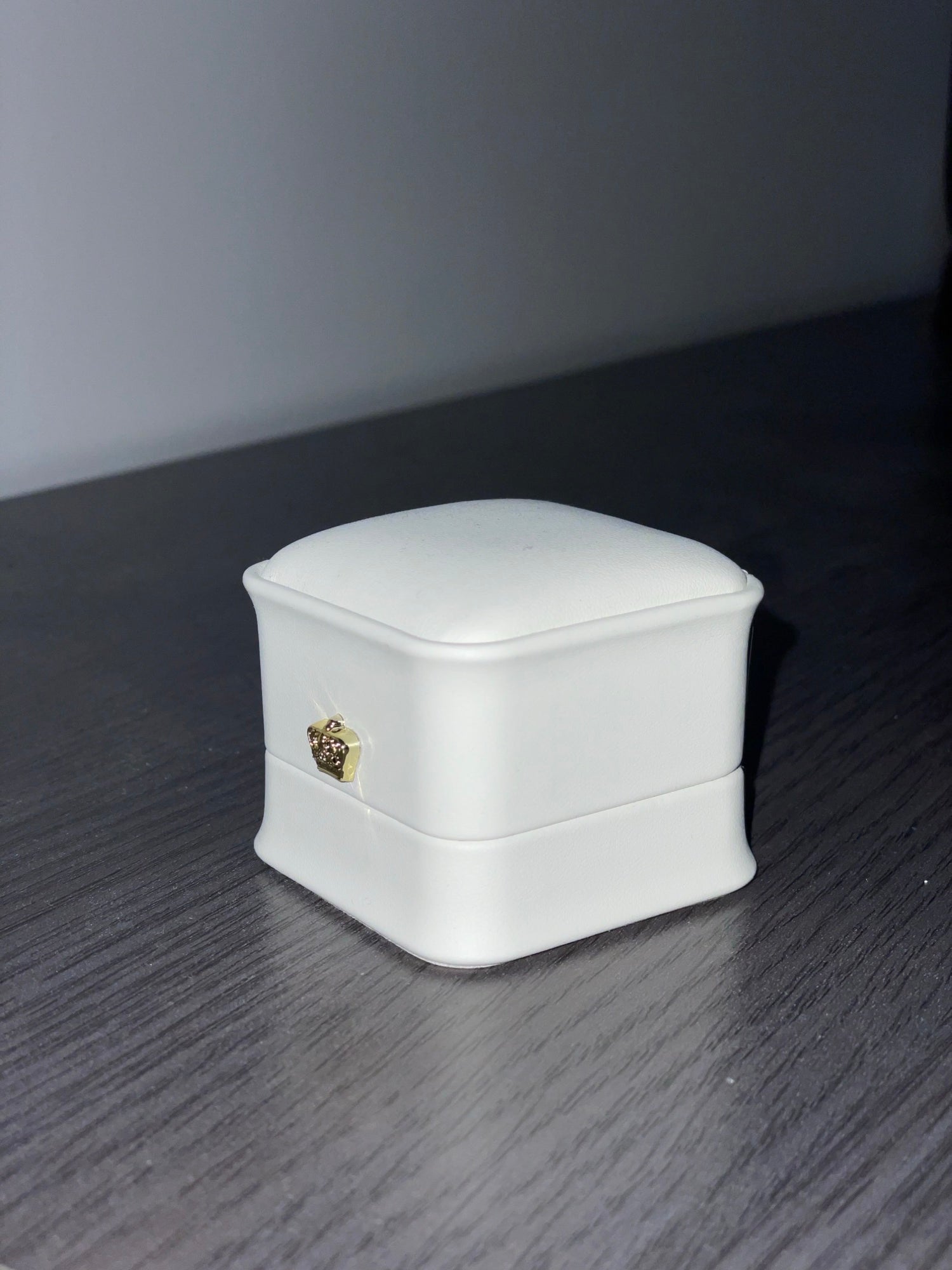 Ivory Ormelya Signature ring box with gold crown for a June wedding proposal