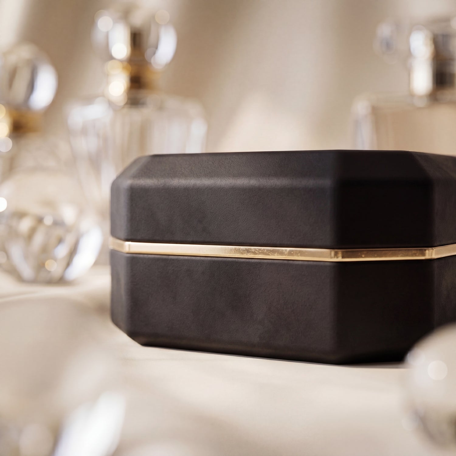 Ormelya Sovereign · open with engagement ring lit by integrated LED · indigo velvet interior