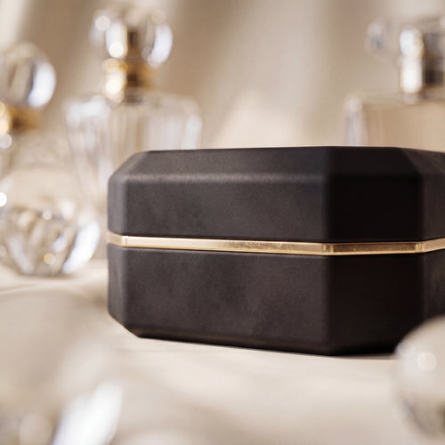 Ormelya Sovereign · open with engagement ring lit by integrated LED · indigo velvet interior